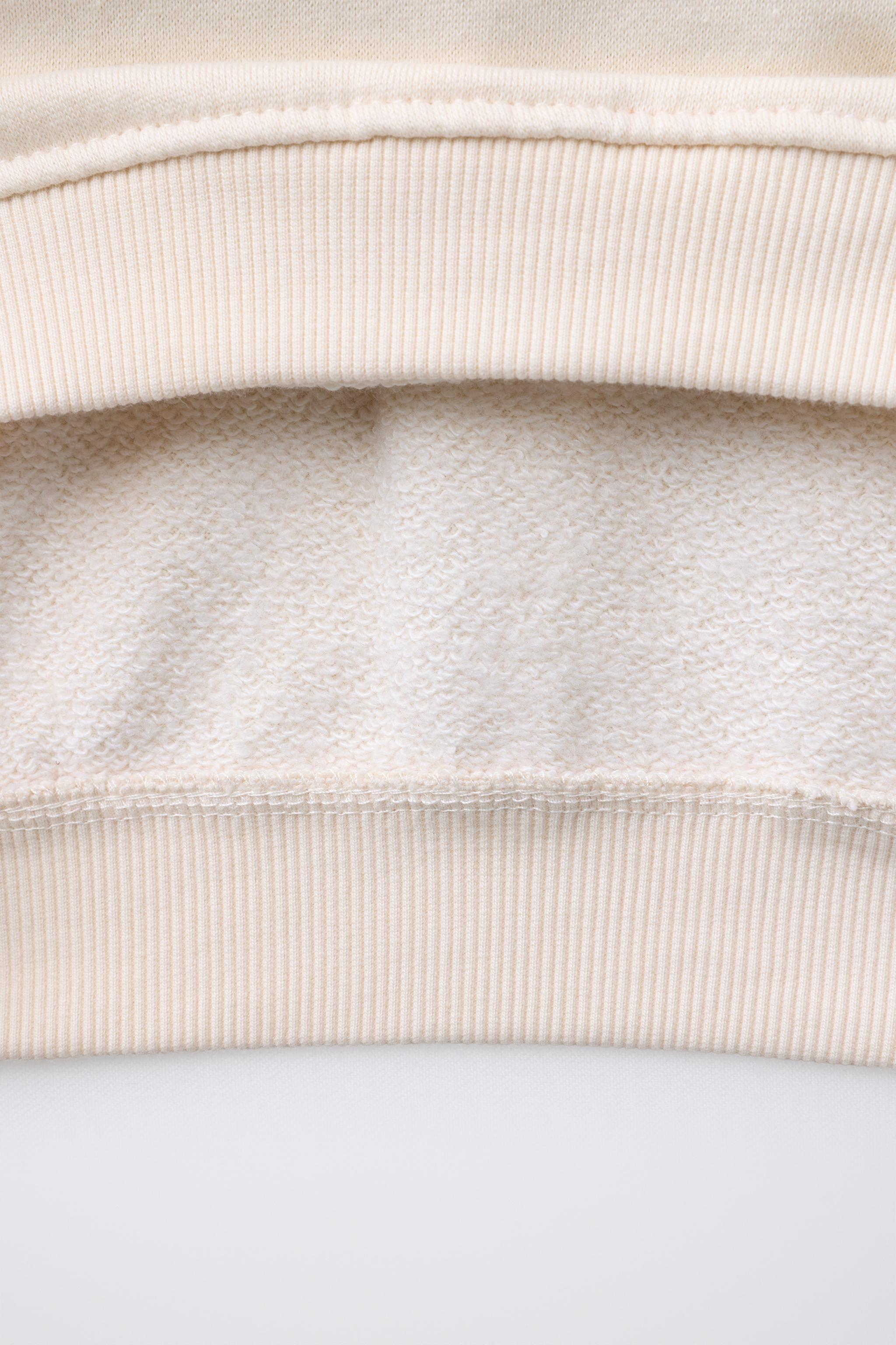 NUMBER ZIP SWEATSHIRT